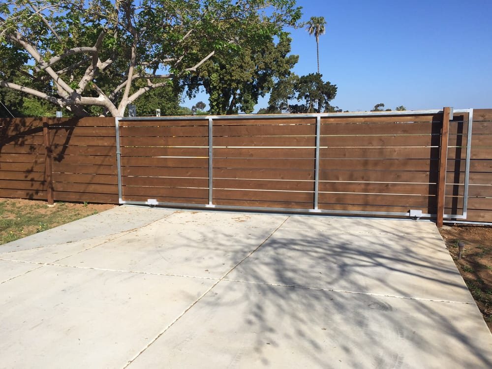 Twenty-foot-wide custom wood driveway gate
