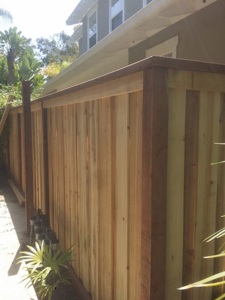 Board-on-board cedar privacy fence with no gaps between boards